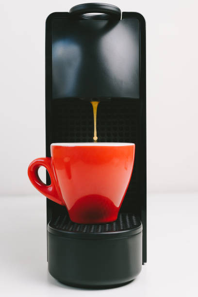 Close-Up Of Coffee Cup Against Black Background