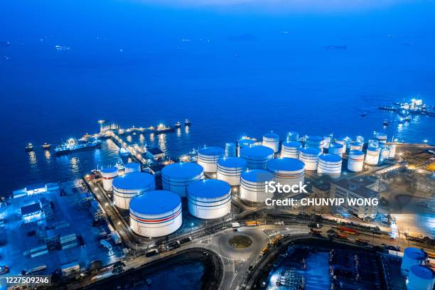 Storage Tank Of Liquid Chemical And Petrochemical Product Tank Aerial View At Night Hong Kong Stock Photo - Download Image Now