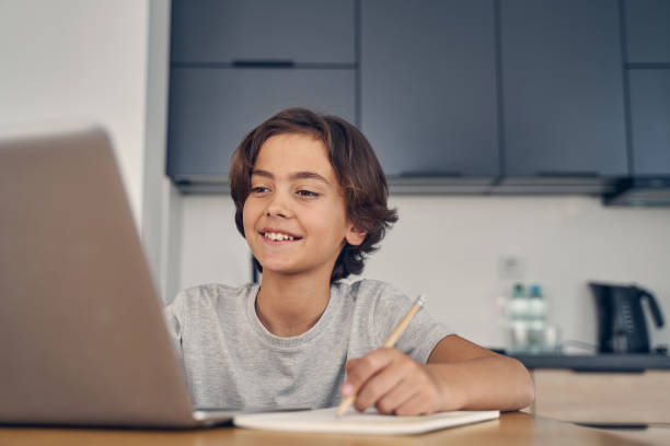 istock Cute Caucasian child staying alone at home 1227514739