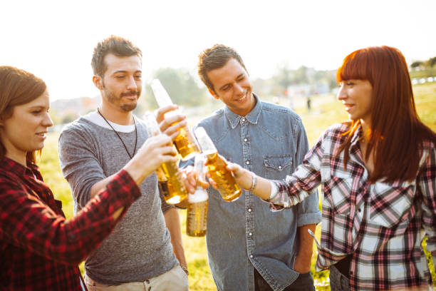 istock happiness friends cheering outdoors 1227515499