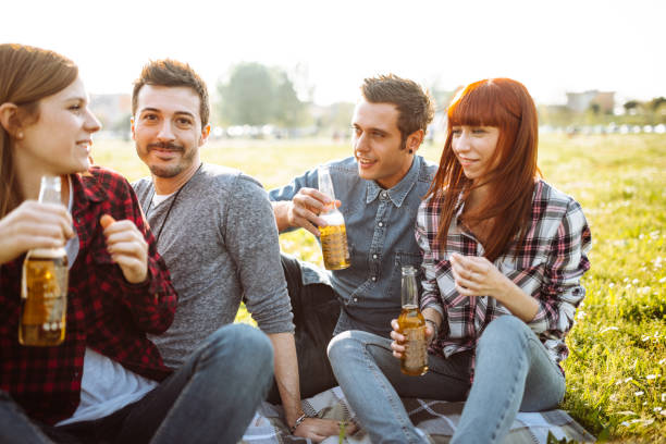 istock happiness friends cheering outdoors 1227515573