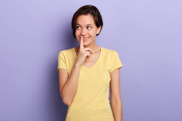istock Thoughtful attractive smiling young woman looking aside 1227516284