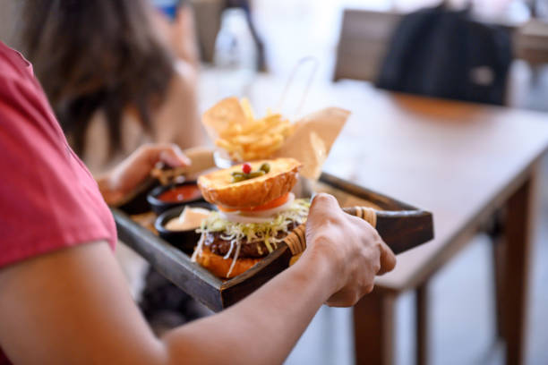 istock Serving burger and French fries 1227520893