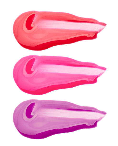 Vivid red and pink fluid lips gloss samples, isolated