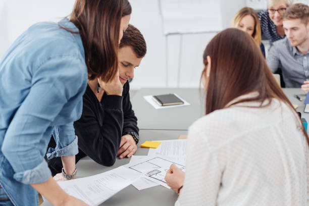 istock Group of business people in a design workshop 1227527367
