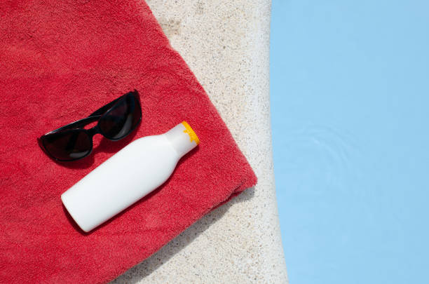 pool, towel and suncream