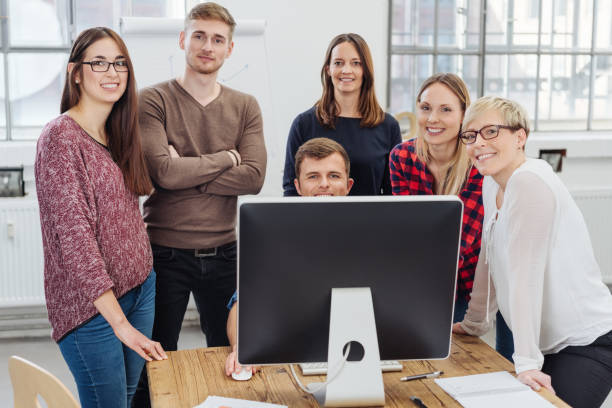 istock Successful motivated young business team 1227530273