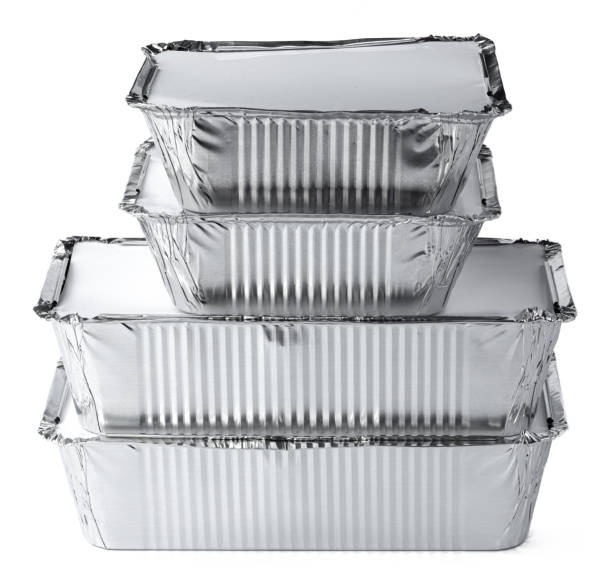 istock Packed foil food boxes on white background, copy space 1227531666