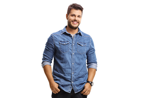 Young smiling guy in a denim shirt isolated on white background