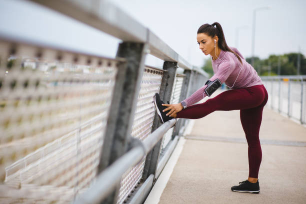 istock Young sportswoman warming up before training outdoors 1227538207