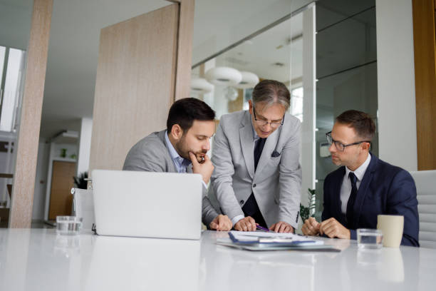 istock Brainstorming over project in the board room 1227538633