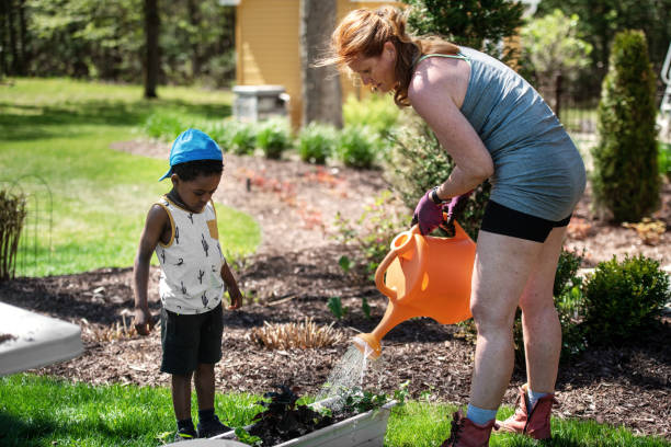 istock Woman gardening with her son 1227539430