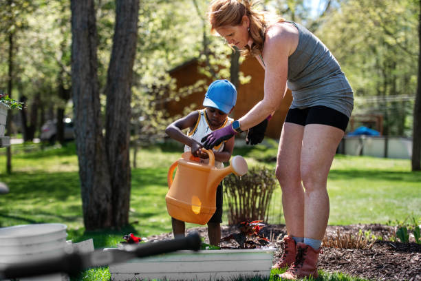 istock Woman gardening with her son 1227539536
