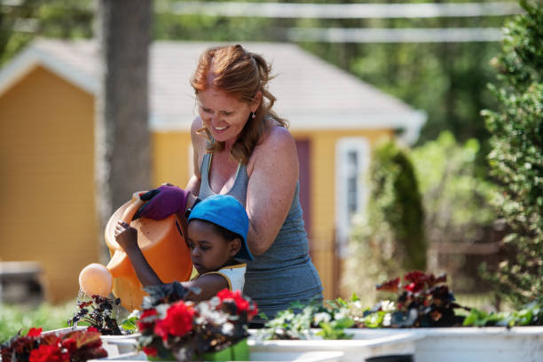 istock Woman gardening with her son 1227539576