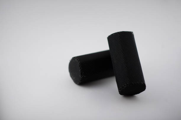 istock Charcoal briquettes on white background 1227539720