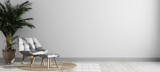 istock Bright modern room interior with gray armchair and palm tree, empty room interior background, white wall mockup, scandinavian style interior room mock up, 3d rendering 1227541185