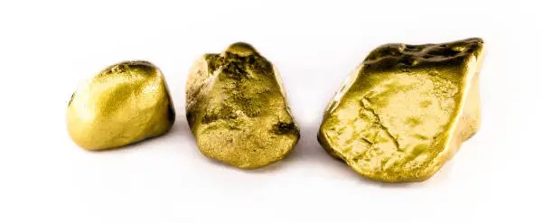 Gold stone in high resolution. Gold on white background isolated. Mineral extraction concept.