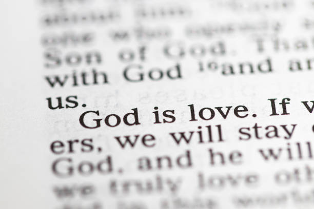 Biblical text. God is love. Christian concept Biblical text. God is love. Christian concept. religious text stock pictures, royalty-free photos & images
