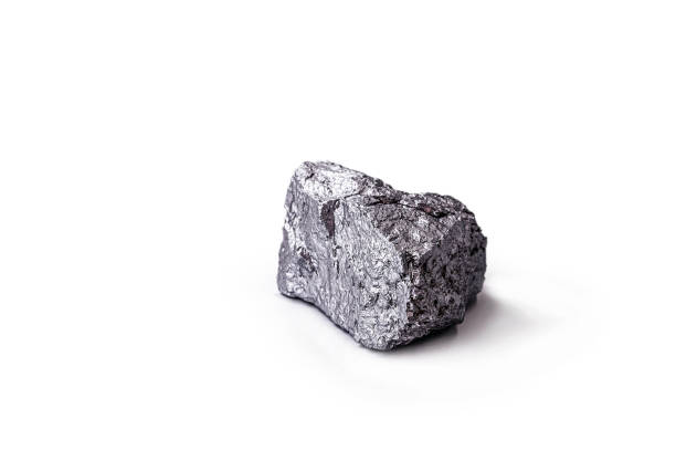istock big big silver nugget on black background. Raw silver stone, silver nugget native to Liberia, isolated on black background. Mineral extraction. 1227544540