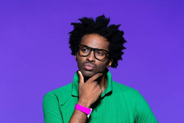 istock Colored portrait of thoughtful young man with dreadkocks 1227545166