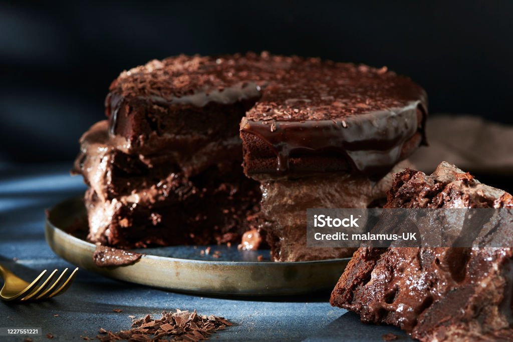 Homemade triple layer chocolate cake Chocolate Cake Stock Photo