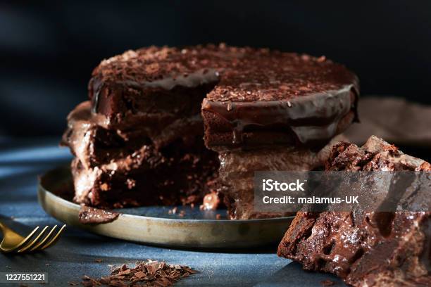 Homemade Triple Layer Chocolate Cake Stock Photo - Download Image Now - Chocolate Cake, Cake, Fork