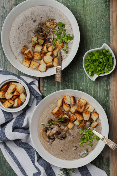 istock Creme soup with mushrooms in white bowl 1227554615