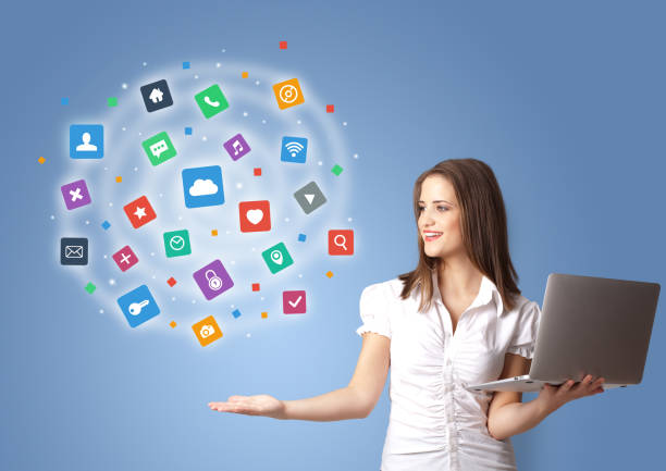 istock Person presenting new application icons and symbols 1227554820