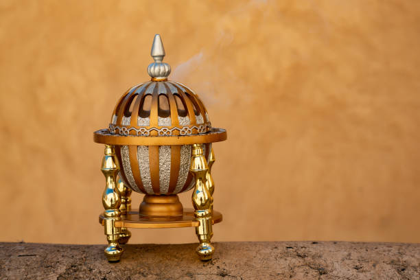 Omani incense burner sitting on a wall in Nizwa fort and steaming