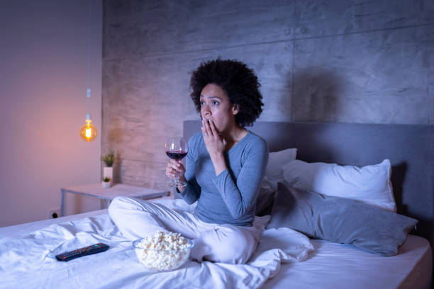istock Woman watching TV 1227557232