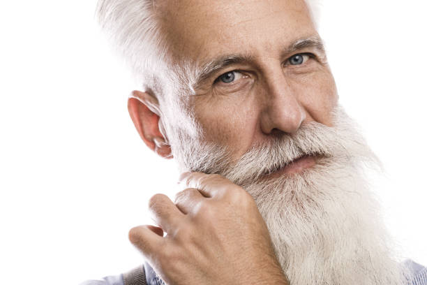 istock Handsome bearded senior man on white background 1227558185