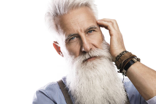 istock Handsome bearded senior man on white background 1227558204
