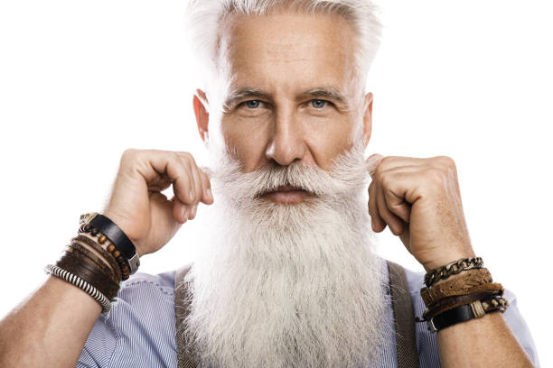 istock Handsome bearded senior man on white background 1227558249