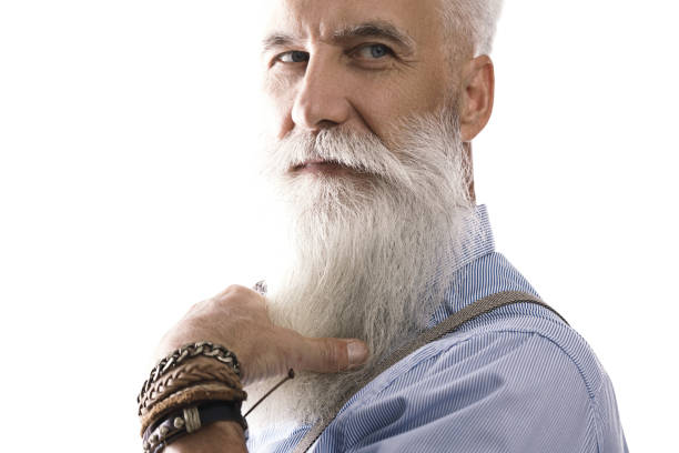 istock Handsome bearded senior man on white background 1227558261