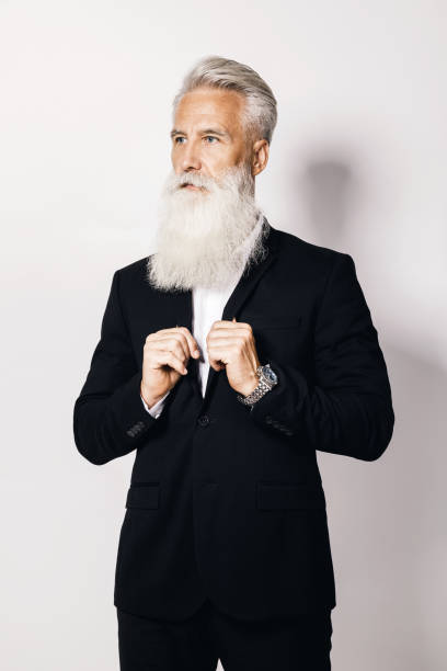 istock Handsome aged man wearing stylish black suit 1227560398