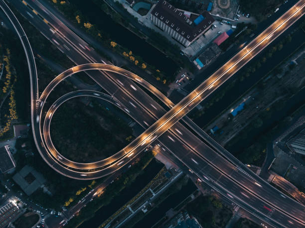 istock Top View of Road Intersection at Night 1227560661