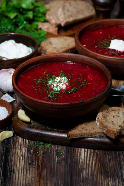 istock traditional russian dish borsch with sour cream, vertical 1227562767