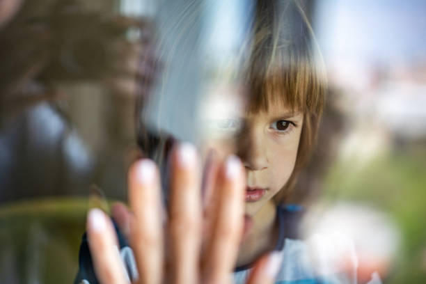 istock Sad little boy in home during epidemic coronavirus 1227562798