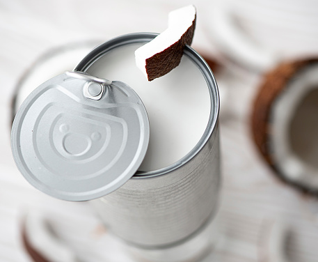coconut milk in an open can with coconut
