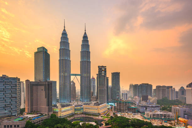 istock Kuala Lumpur, Malaysia park and skyline 1227563215