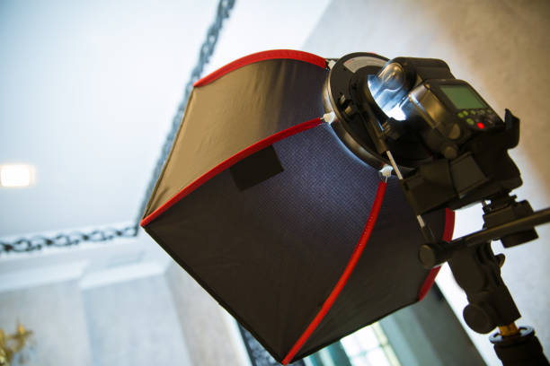 istock Soft-box Diffuser for Speed-light Speed-lite . The birthday uses a soft-box for shooting . 1227568308