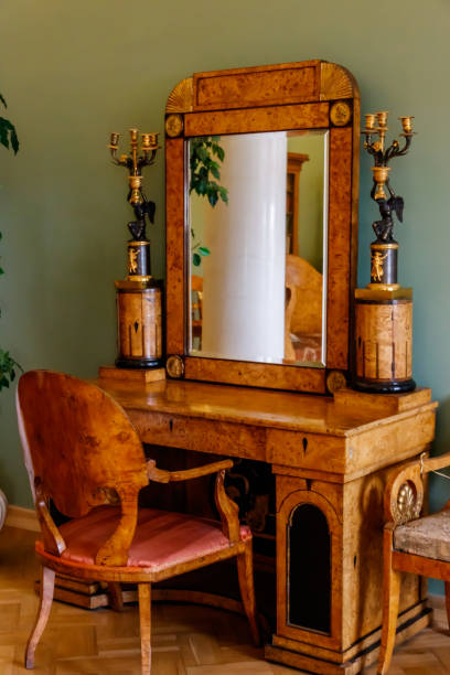 istock Vintage wooden dressing table with mirror in a room 1227570405