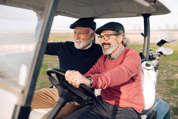 istock Happy seniors going to play golf 1227575558