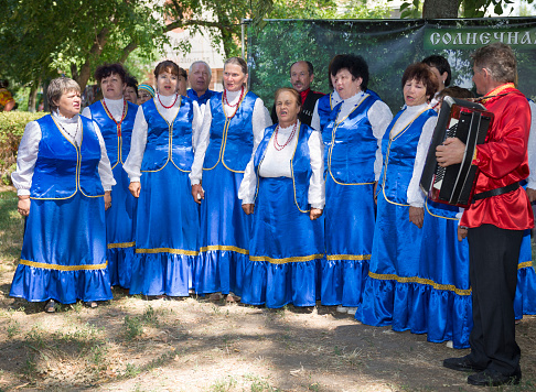 Starocherkasskaya,Rostov Region, Russia- July 26,2014:Cossack choir singing in the park of the village Starocherkasskaya