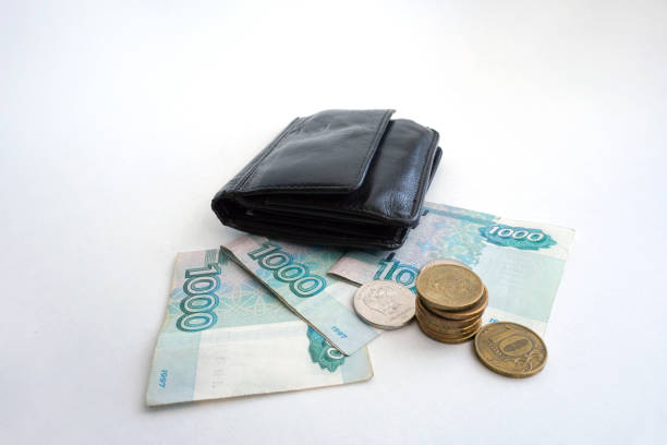 istock Russian banknotes and coins on a white background, layout for the workspace 1227577623
