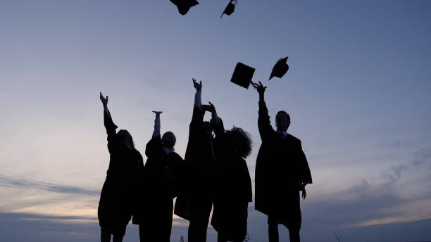 istock Silhouette of Diverse International Students Celebrating Graduat 1227577986