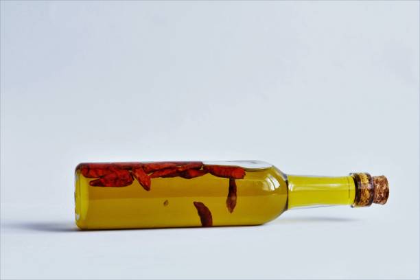 istock Red dried chili pepper inside olive oil bottle 1227581511