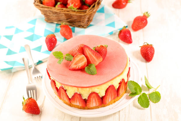 istock strawberry cake with cream on wood background 1227583380