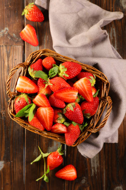 istock wicker basket with fresh strawberry 1227583392