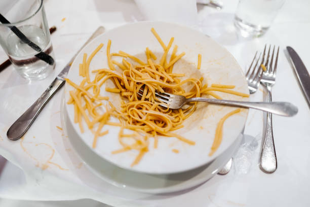 istock photo of spaghetti in a plate with a fork 1227584713